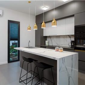 Luxury Beachfront Villa with Heated Infinity Pool near Trogir, Sleeps 8